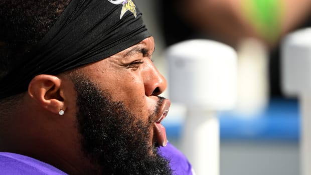 Oct 1, 2023; Charlotte, North Carolina, USA; Minnesota Vikings defensive end Jonathan Bullard (90) on the sidelines in the third quarter at Bank of America Stadium.